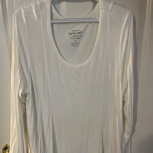 Long-sleeve white top.